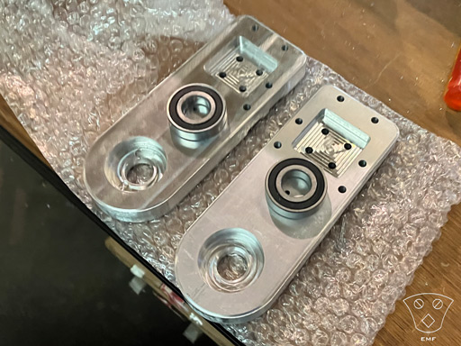 CNC Machined Rotating Brackets with Inset Bearings